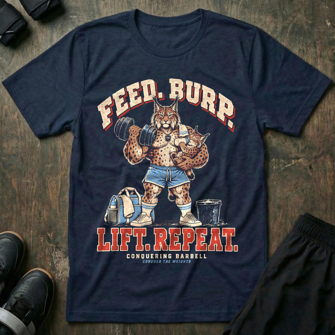 Feed. Burp. Lift. Repeat - Tee front graphic in Navy with a lynx dad curling a dumbbell while bottle-feeding a baby lynx with a burp cloth on his shoulder - Conquering Barbell