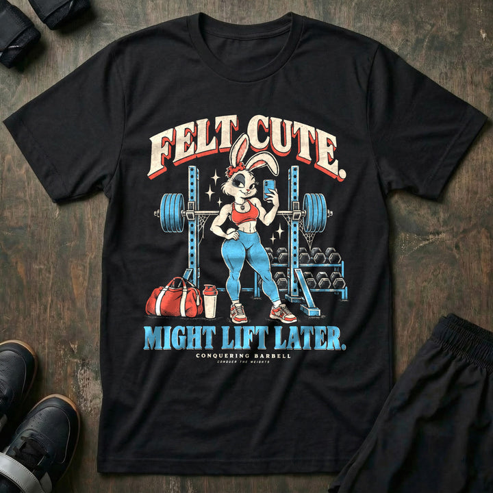 Felt Cute Might Lift Later - Tee front graphic in Black with a fit bunny taking a mirror selfie in front of a loaded squat rack - Conquering Barbell
