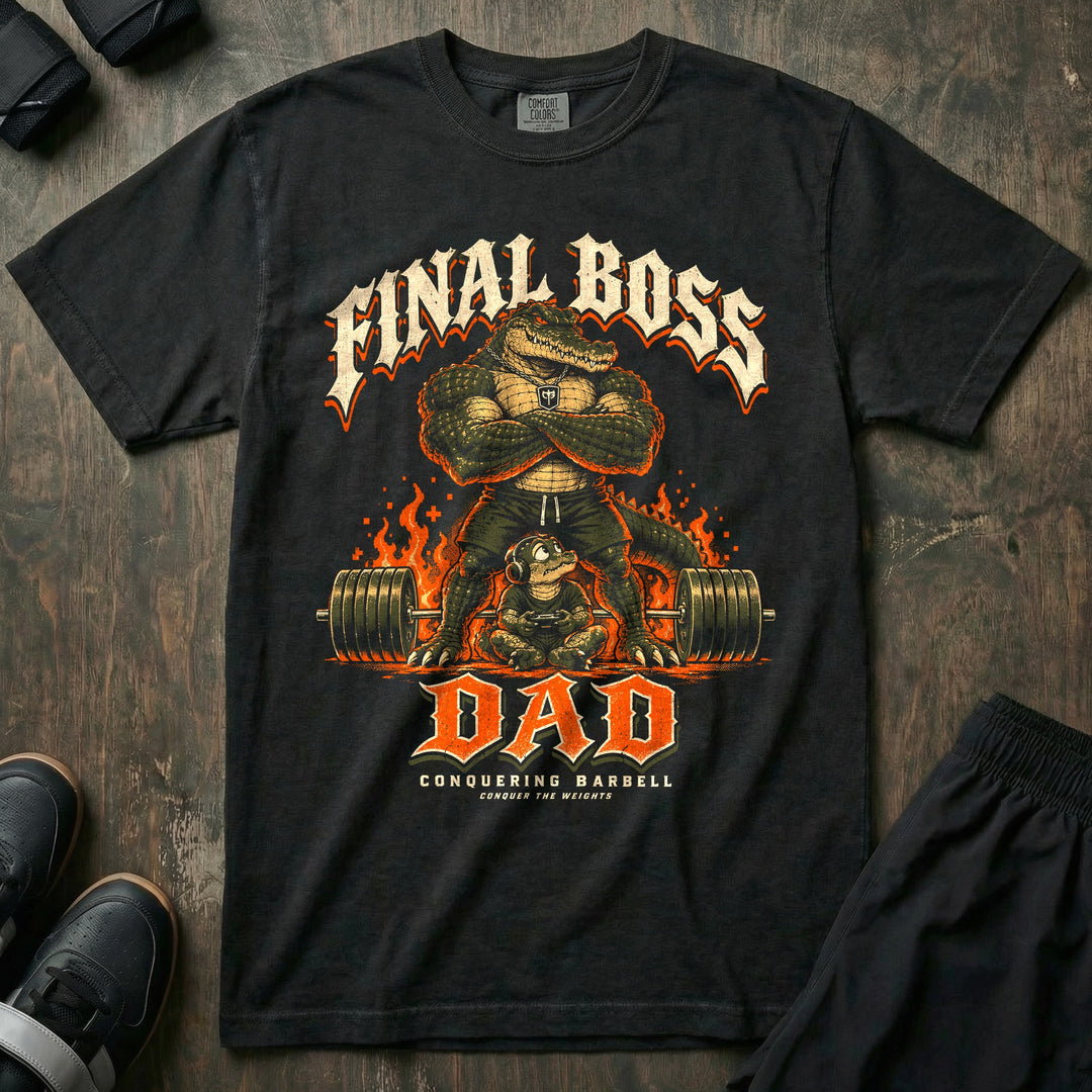 Final Boss Dad - Relaxed Fit Tee front graphic in Black with an alligator dad with crossed arms standing over a loaded barbell and flames while a young alligator with a headset plays a video game - Conquering Barbell