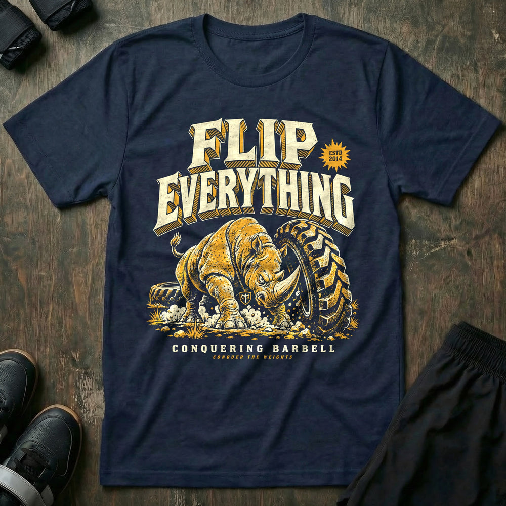 Flip Everything - Tee front graphic in Navy with a rhino flipping a giant tractor tire - Conquering Barbell