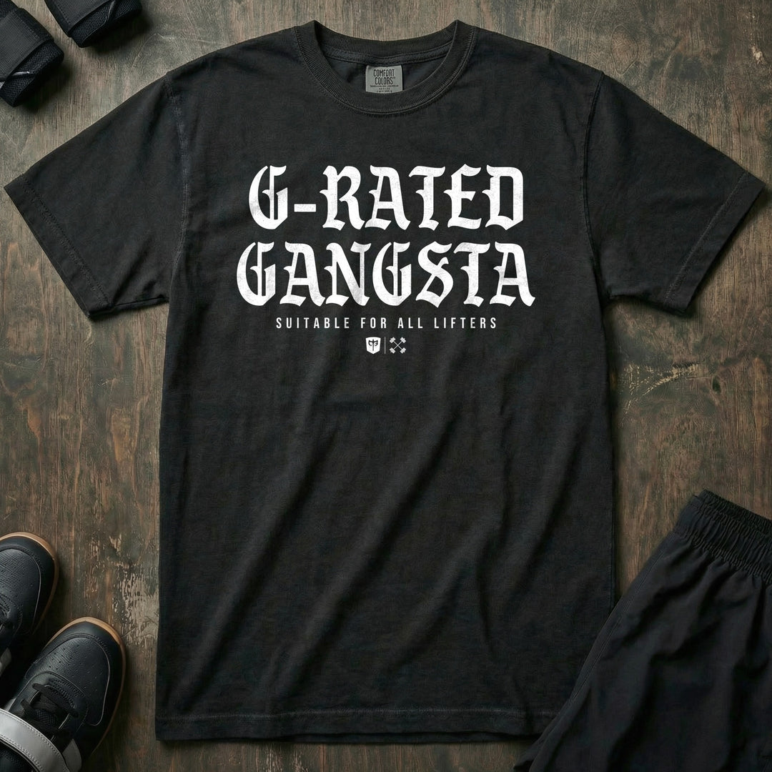 G-Rated Gangsta - Relaxed Fit Tee front graphic in Black with G-RATED GANGSTA in blackletter over SUITABLE FOR ALL LIFTERS and the Conquering Barbell shield - Conquering Barbell