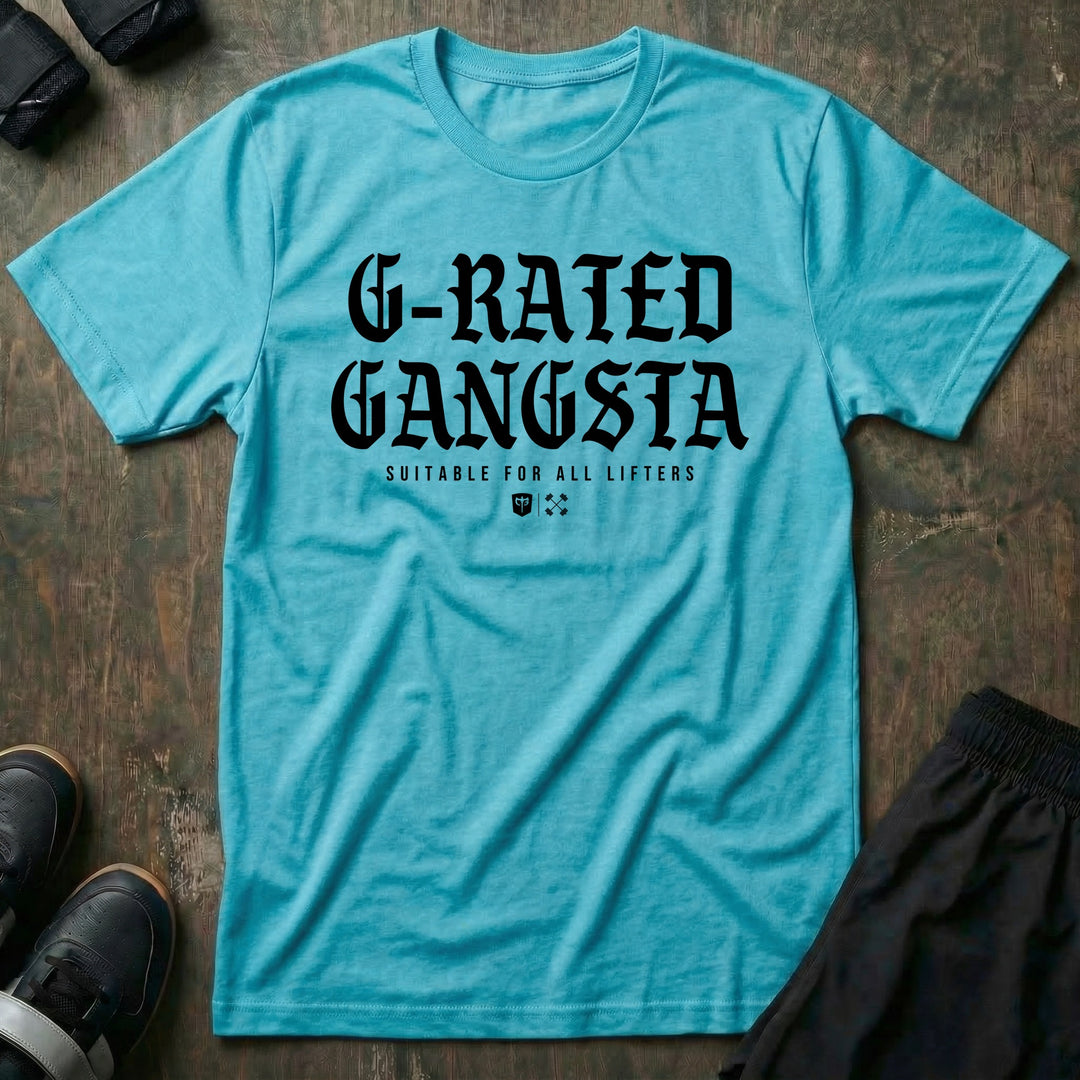 G-Rated Gangsta - Tee front graphic in Tahiti with G-RATED GANGSTA in blackletter over SUITABLE FOR ALL LIFTERS and the Conquering Barbell shield - Conquering Barbell