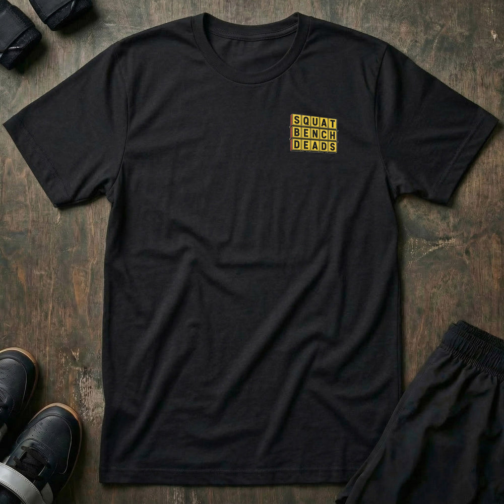 Gainz House tee: a retro diner sign stacked with SQUAT BENCH DEADS in bold yellow lettering