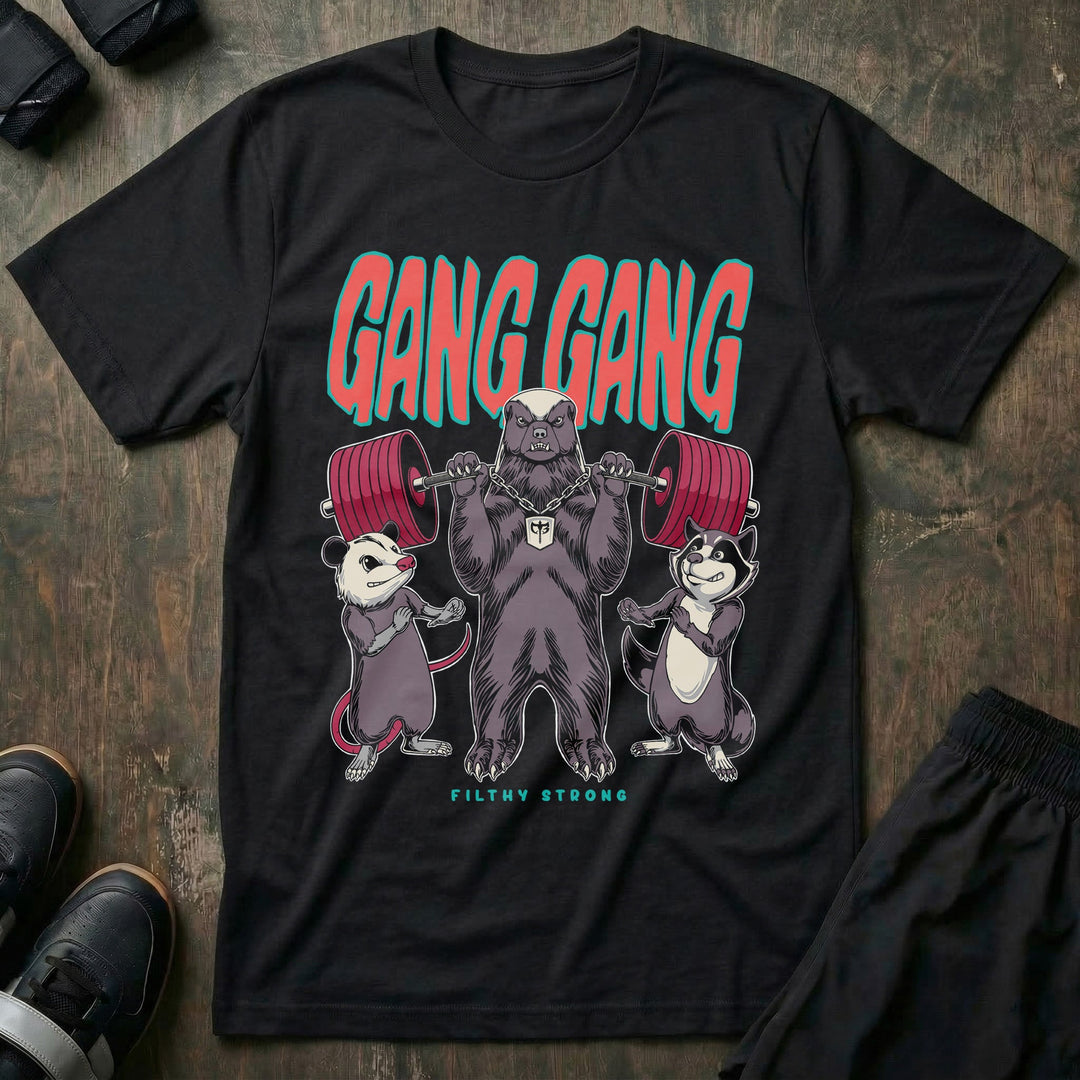 Gang Gang tee in Black: a panther squatting a red barbell flanked by two little sidekicks pressing their own