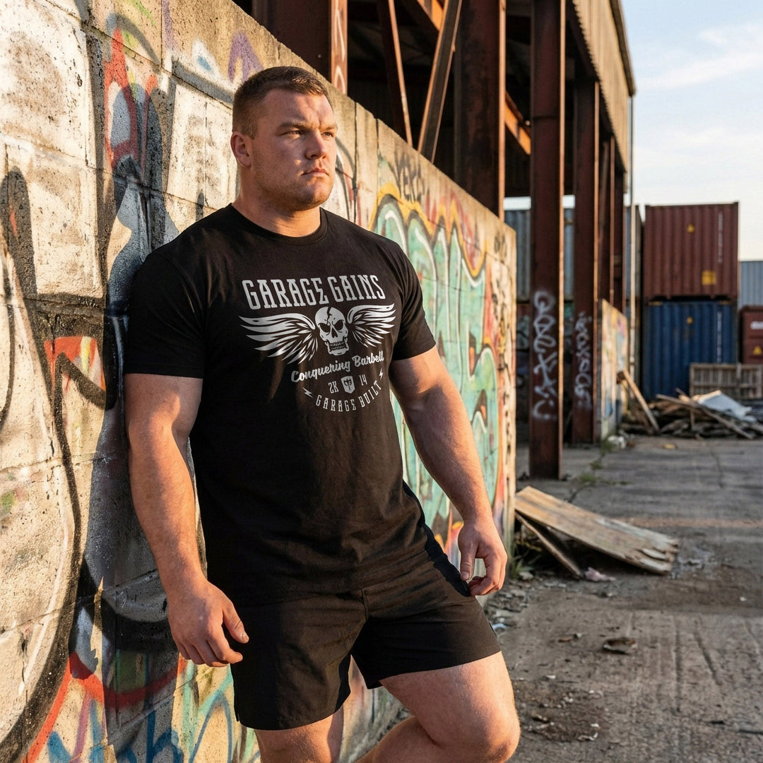 Garage Gains tee in Black: a winged skull with GARAGE GAINS across the top