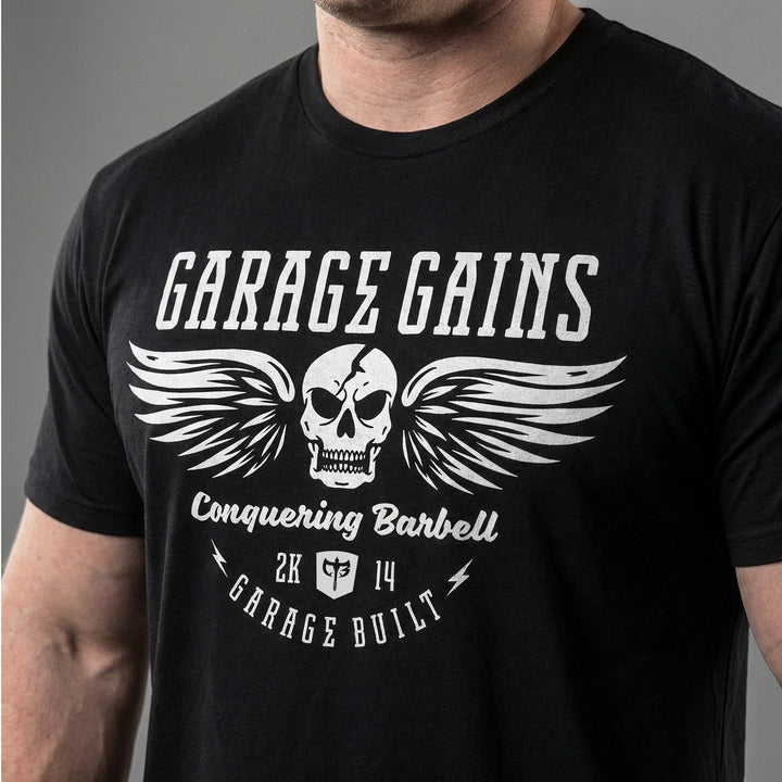 Garage Gains tee in Black: a winged skull with GARAGE GAINS across the top
