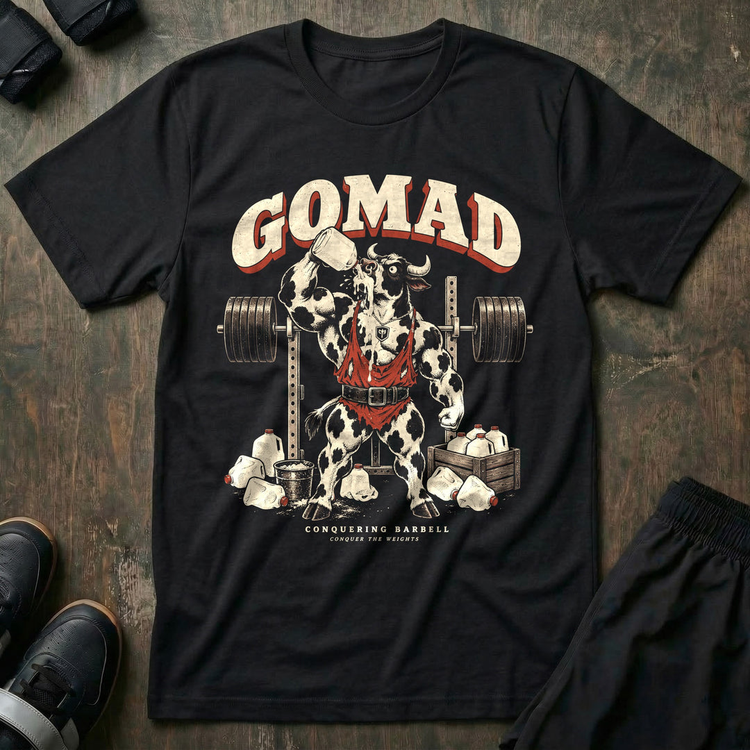 GOMAD - Tee front graphic in Black with a Holstein bull in a singlet chugging a gallon of milk at the squat rack - Conquering Barbell