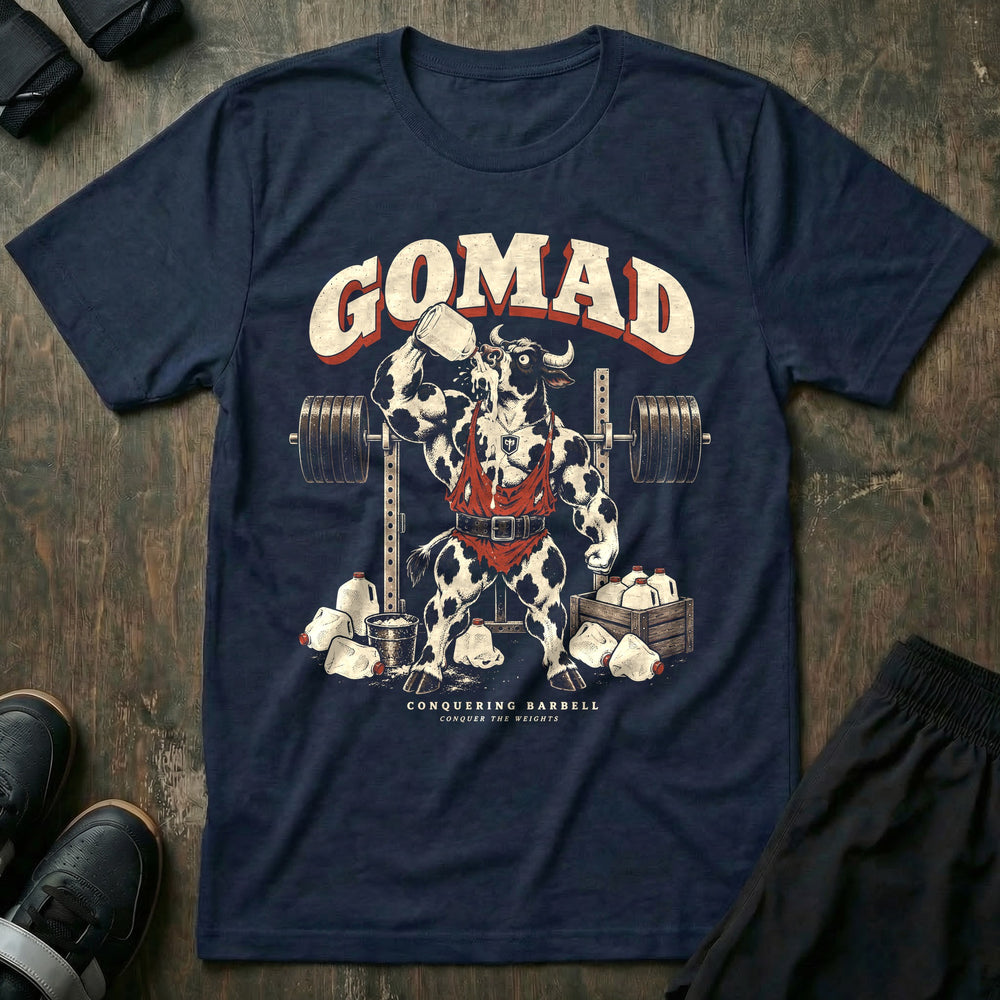GOMAD - Tee front graphic in Navy with a Holstein bull in a singlet chugging a gallon of milk at the squat rack - Conquering Barbell
