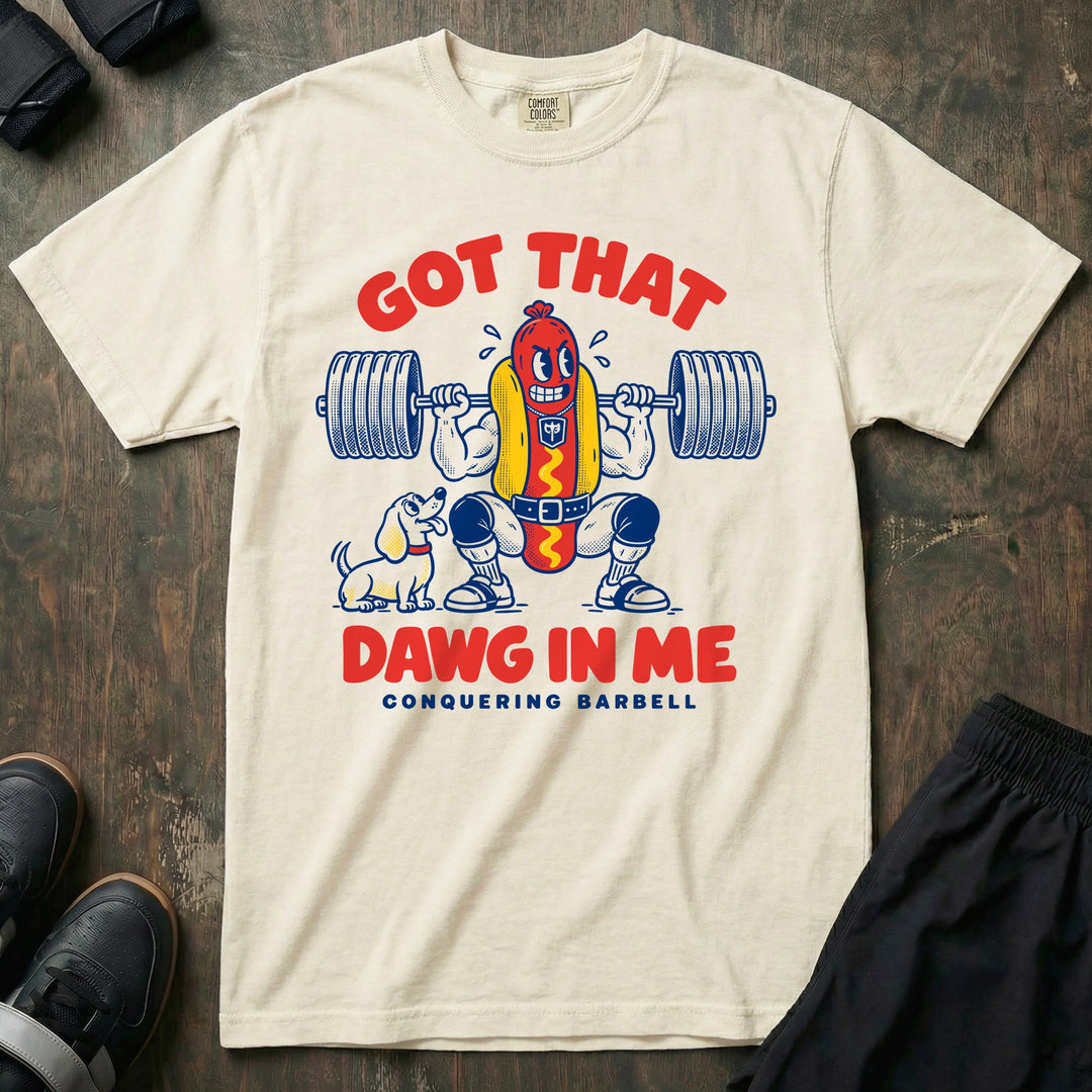 Got That Dawg in Me - Relaxed Fit Tee front graphic in Ivory with a hot dog in a bun back squatting a loaded barbell while a dachshund watches - Conquering Barbell