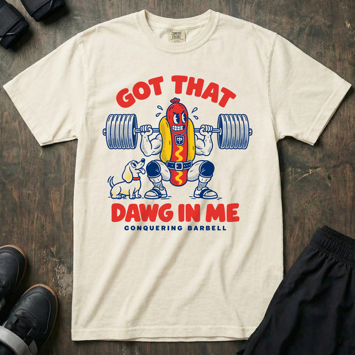 Got That Dawg in Me - Relaxed Fit Tee front graphic in Ivory with a hot dog in a bun back squatting a loaded barbell while a dachshund watches - Conquering Barbell