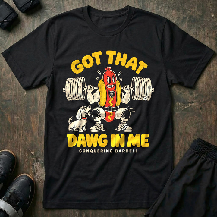 Got That Dawg in Me - Tee front graphic in Black with a hot dog in a bun back squatting a loaded barbell while a dachshund watches - Conquering Barbell