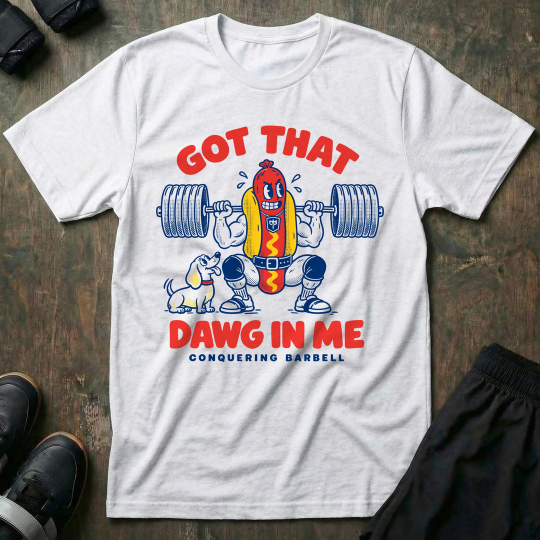Got That Dawg in Me - Tee front graphic in White with a hot dog in a bun back squatting a loaded barbell while a dachshund watches - Conquering Barbell