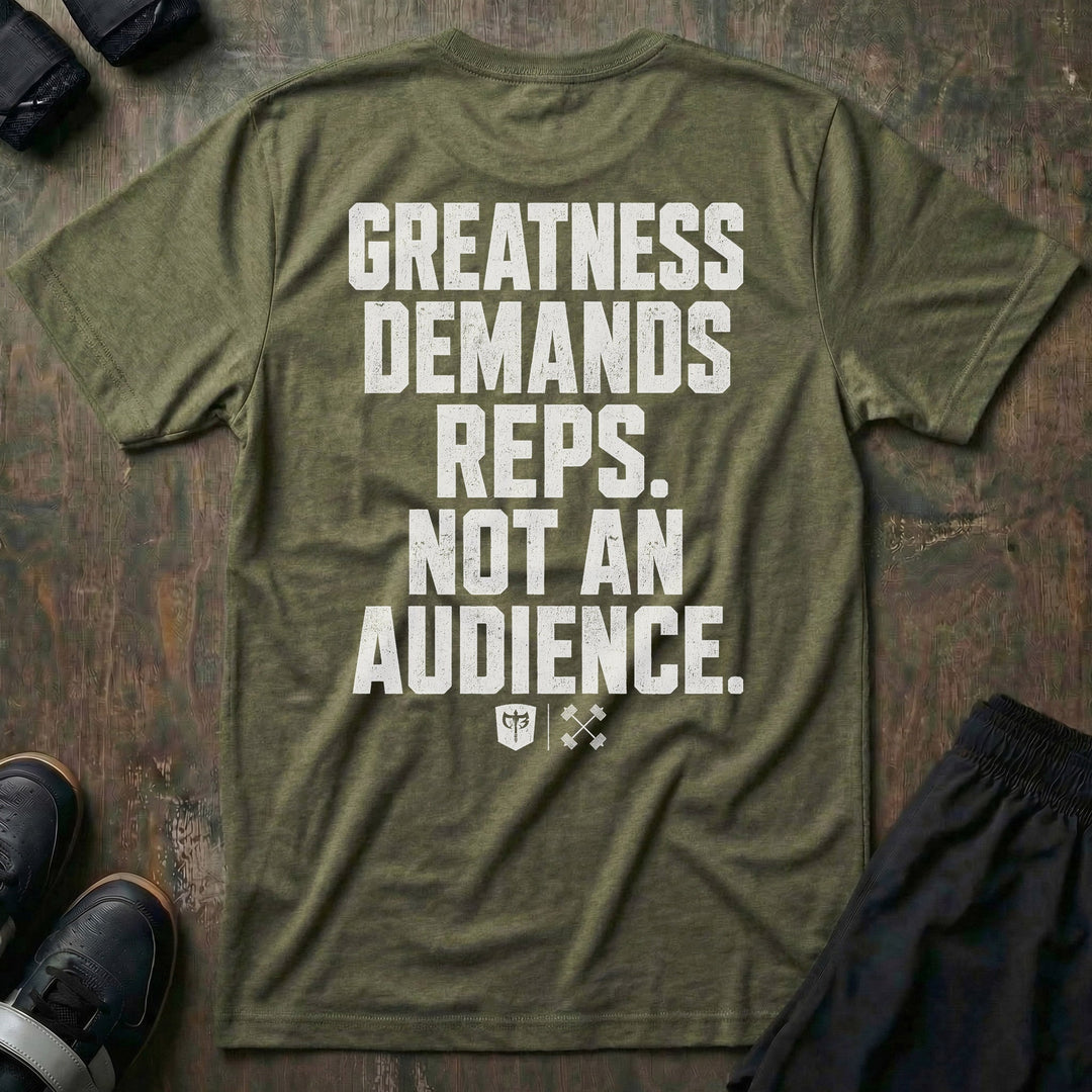 Greatness Demands Reps. Not an Audience. tee in Military: the full statement in oversized distressed block lettering stacked