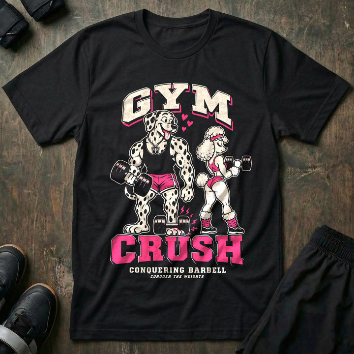 Gym Crush - Tee front graphic in Black with a lovestruck Dalmatian dropping a dumbbell on his foot while staring at a poodle - Conquering Barbell
