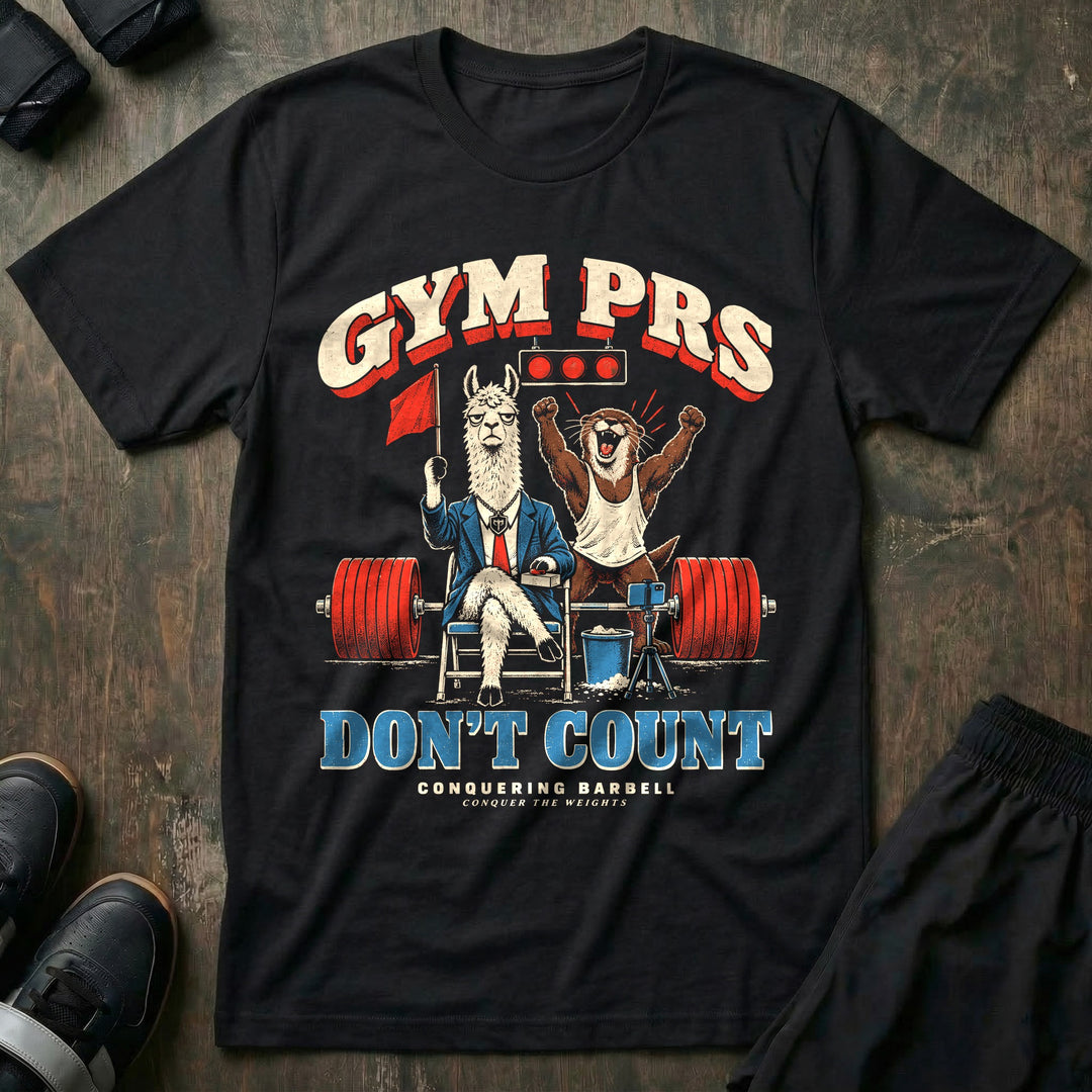 Gym PRs Don't Count - Tee front graphic in Black with a llama meet judge raising a red flag while an otter celebrates a lift - Conquering Barbell