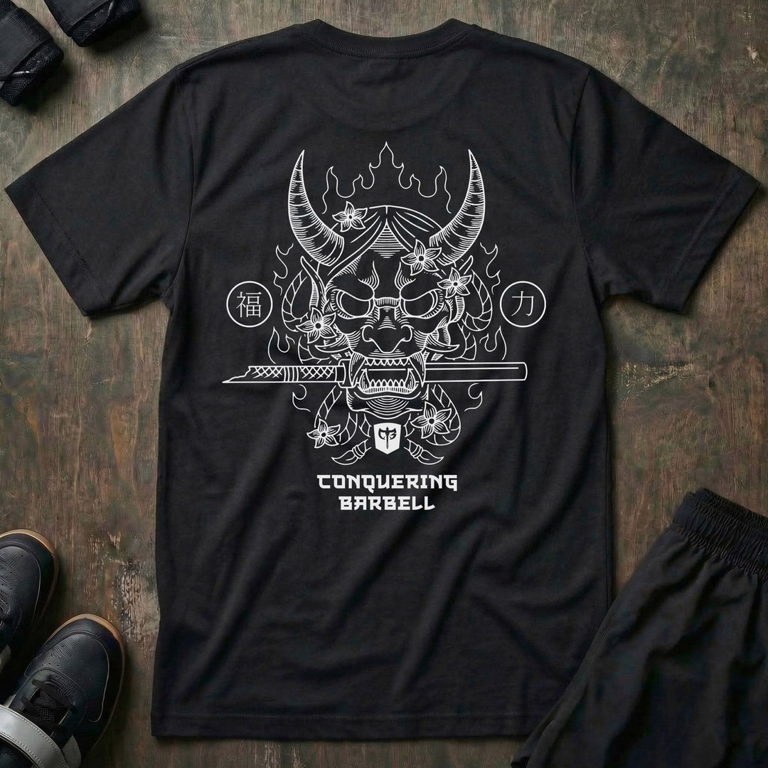 Hannya Mask tee in Black: a horned hannya mask pierced by a sword among blossoms and kanji