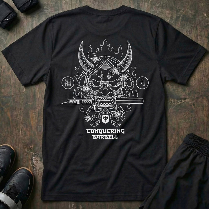 Hannya Mask tee in Black: a horned hannya mask pierced by a sword among blossoms and kanji