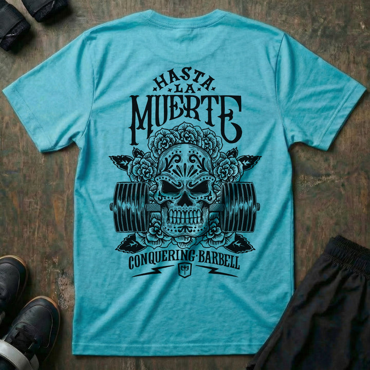 Hasta La Muerte (Until Death) Original Version tee in Tahiti: a sugar skull crowned with roses over a loaded barbell