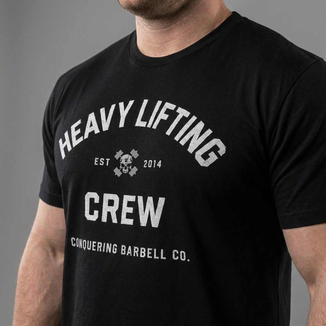 Heavy Lifting Crew tee in Black: HEAVY LIFTING arched over a skull and crossbones with EST 2014
