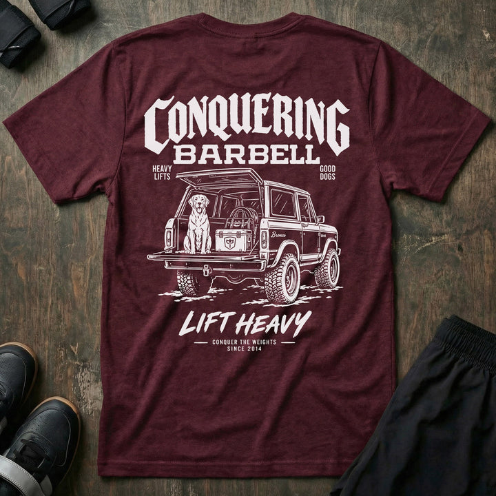 Heavy Lifts, Good Dogs tee in Maroon: a classic SUV with the tailgate down and a good lab sitting patiently