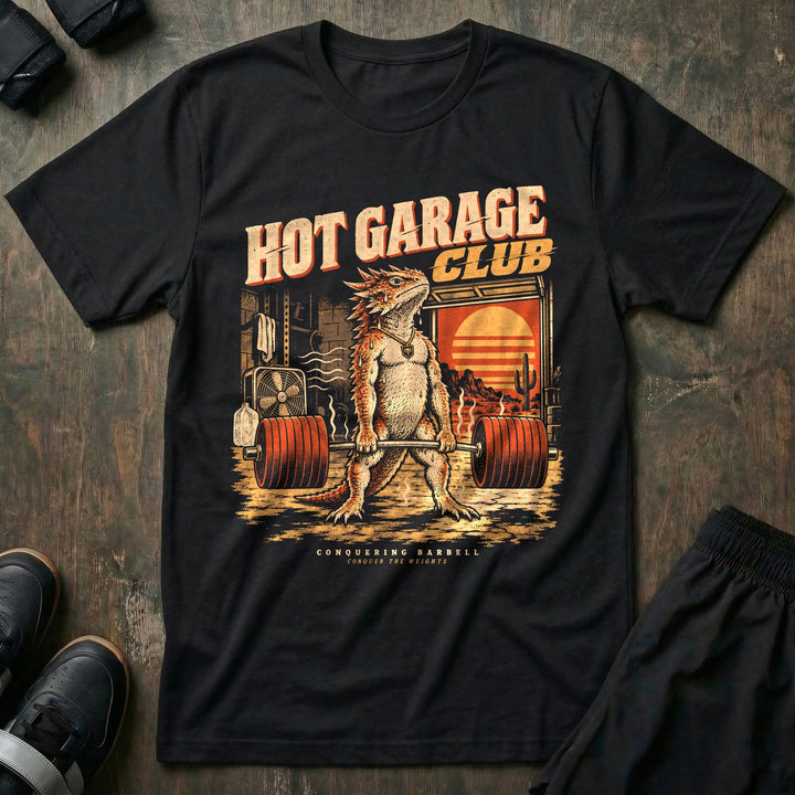 Hot Garage Club - Tee front graphic in Black with a horned lizard deadlifting in a hot garage gym at sunset - Conquering Barbell
