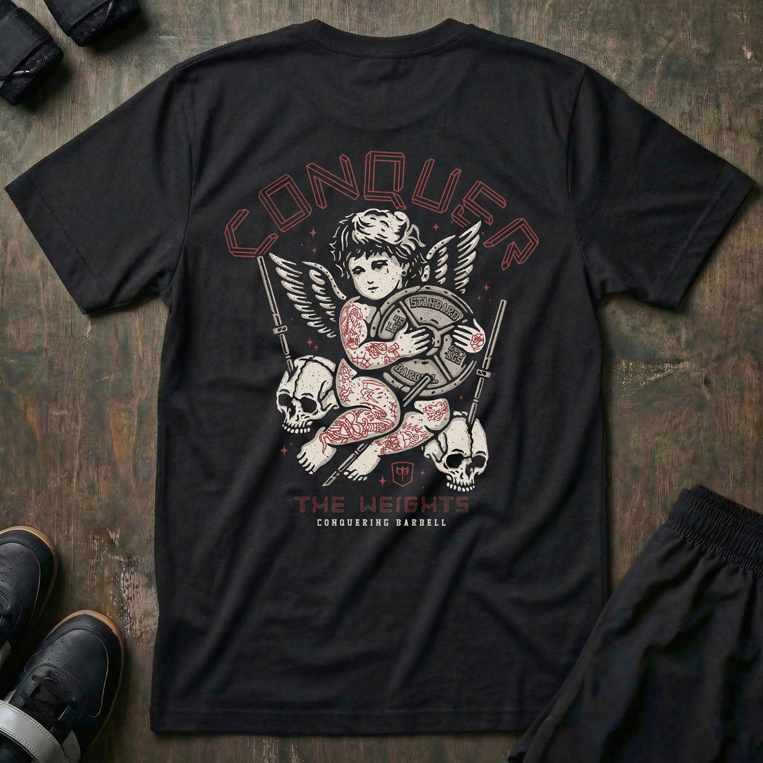 Inked Angel tee in Black: a heavily tattooed cherub clutching a barbell plate