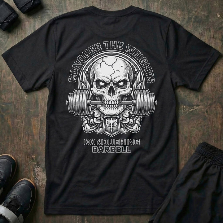 Iron Reaper tee in Black: a cracked skull biting down on a barbell