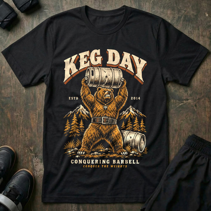 Keg Day - Tee front graphic in Black with a grizzly bear in a lifting belt pressing a keg overhead - Conquering Barbell