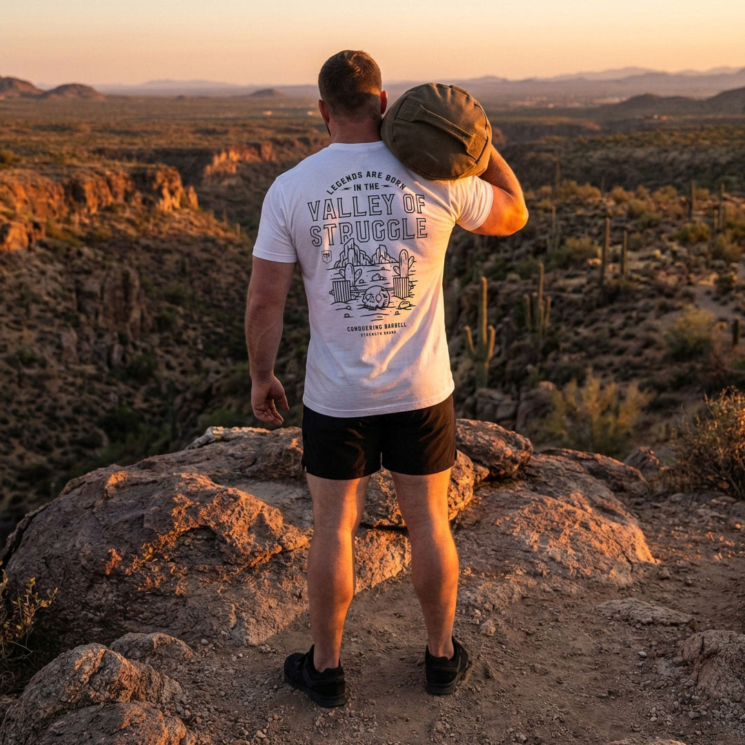 Legends are born in the Valley of Struggle tee: a desert valley scene with rock towers and cacti