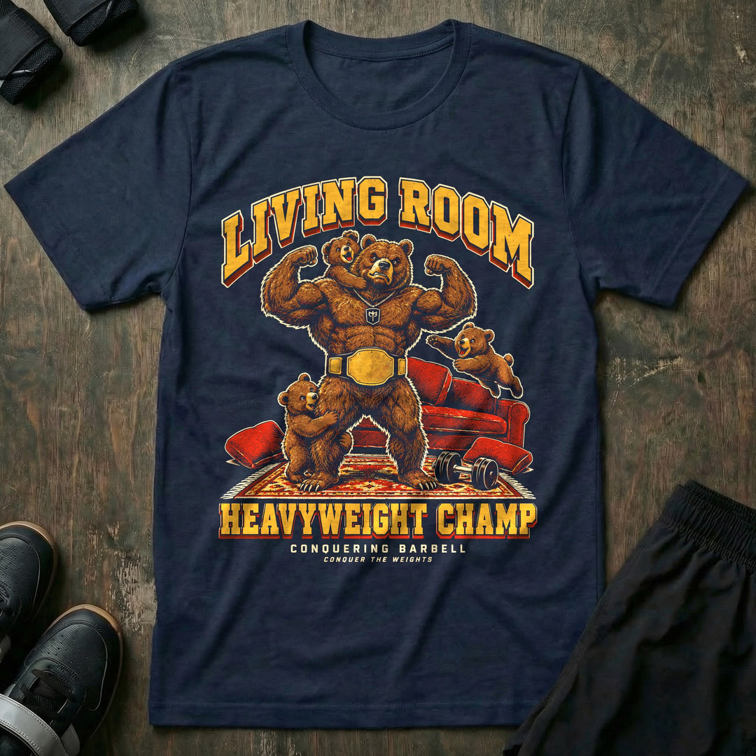 Living Room Heavyweight Champ - Tee front graphic in Navy with a brown bear dad flexing in a gold championship belt while three bear cubs climb on him in a living room - Conquering Barbell