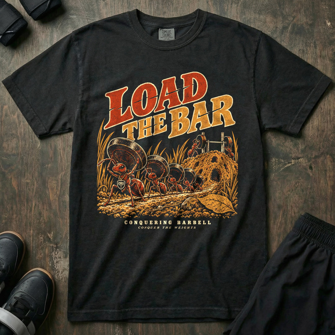 Load the Bar - Relaxed Fit Tee front graphic in Black with a line of ants carrying weight plates up an anthill to a barbell - Conquering Barbell