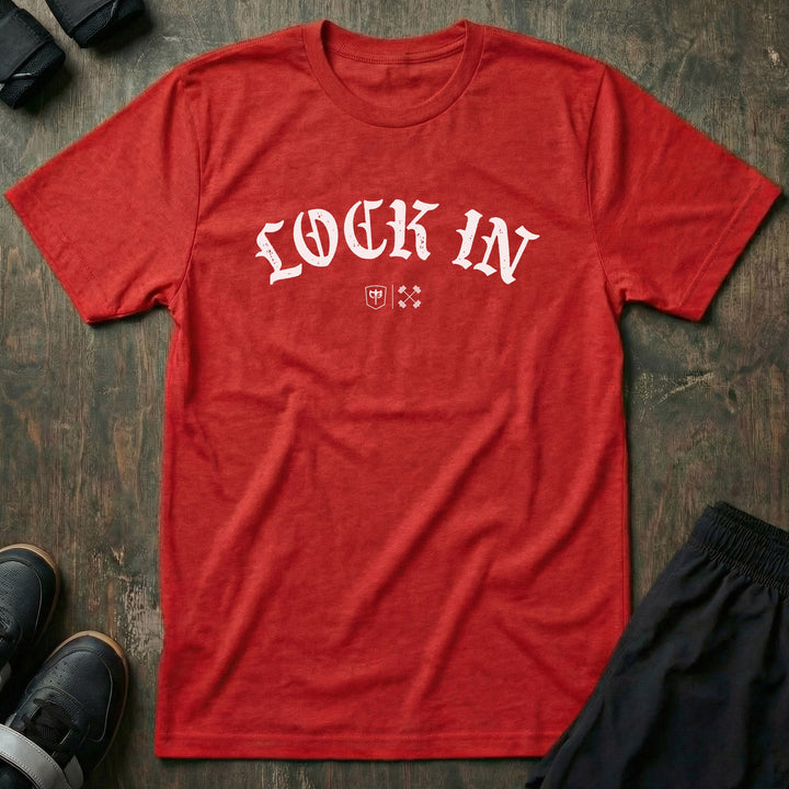 Lock In tee in Red: LOCK IN in bold old English lettering arched across the front with the CB marks below