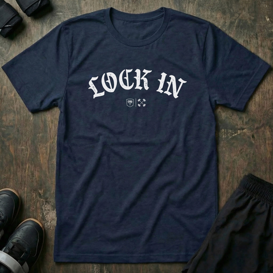 Lock In tee in Navy: LOCK IN in bold old English lettering arched across the front with the CB marks below