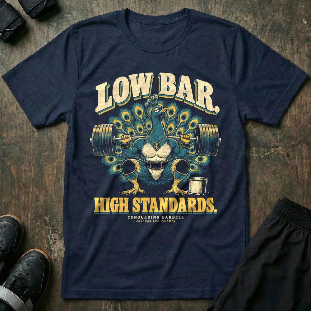 Low Bar High Standards - Tee front graphic in Navy with a peacock with its tail fanned out in a low-bar squat - Conquering Barbell