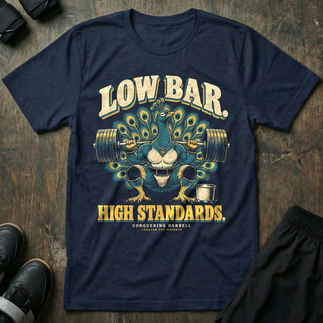 Low Bar High Standards - Tee front graphic in Navy with a peacock with its tail fanned out in a low-bar squat - Conquering Barbell