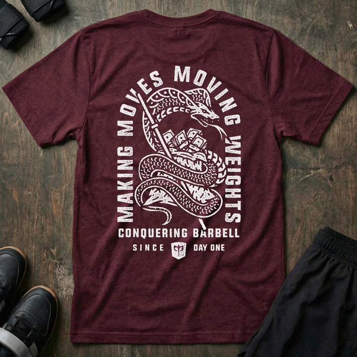 Making Moves, Moving Weights tee in Maroon: a detailed coiled snake gripping a blade and a stack of bills