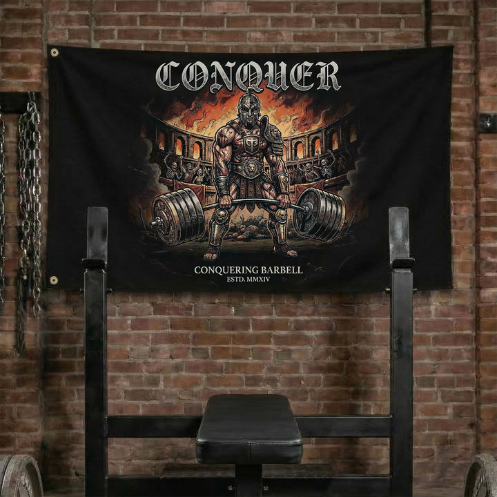 Man in the Arena - Polyester Flag, horizontal black gym flag with gladiator standing in a burning colosseum - Conquering Barbell