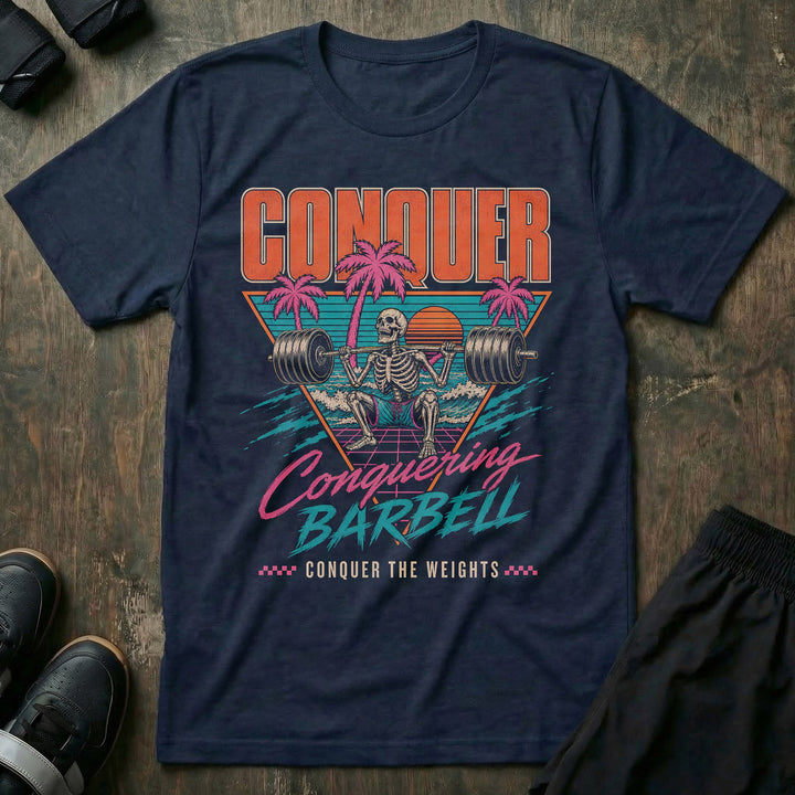 Miami Gains tee in Navy: a skeleton squatting a loaded barbell inside a retro sunset triangle with pink palm trees