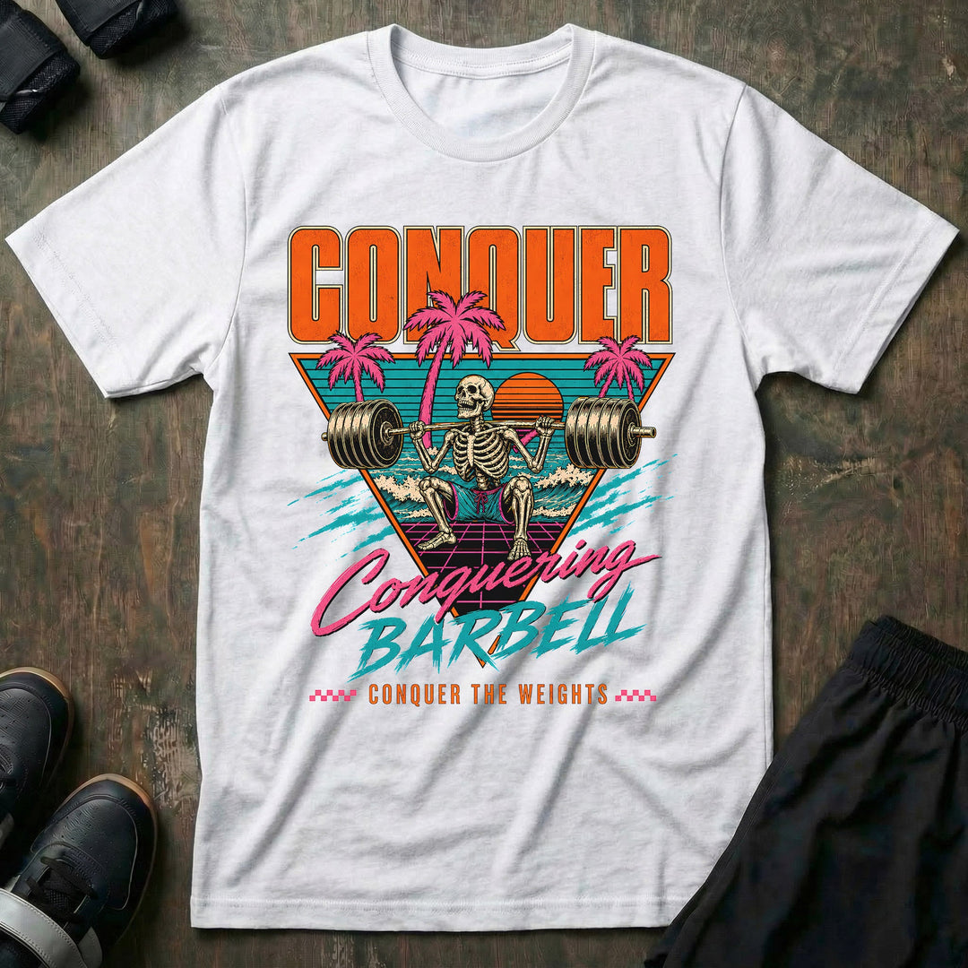 Miami Gains tee in White: a skeleton squatting a loaded barbell inside a retro sunset triangle with pink palm trees