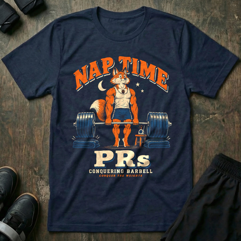 Nap Time PRs - Tee front graphic in Navy with a fox dad quietly deadlifting a loaded barbell onto folded blankets beside a baby monitor - Conquering Barbell