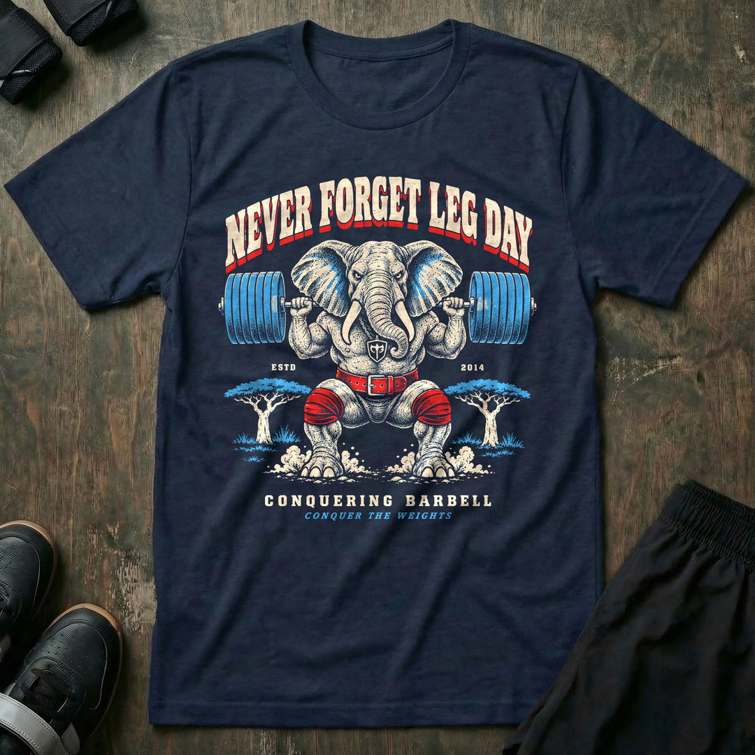 Never Forget Leg Day - Tee front graphic in Navy with an elephant in red knee wraps in a deep barbell squat - Conquering Barbell