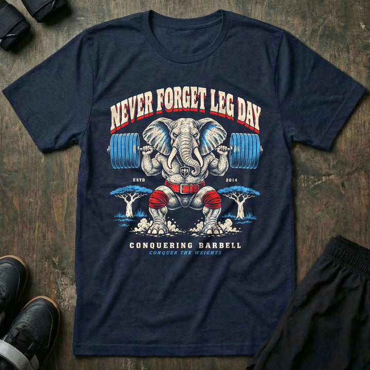 Never Forget Leg Day - Tee front graphic in Navy with an elephant in red knee wraps in a deep barbell squat - Conquering Barbell
