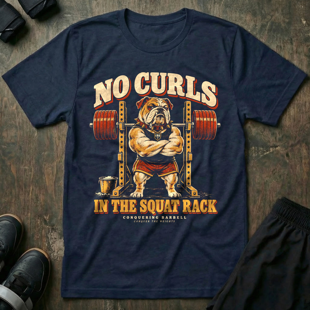 No Curls in the Squat Rack - Tee front graphic in Navy with a bulldog with arms crossed guarding a loaded squat rack - Conquering Barbell
