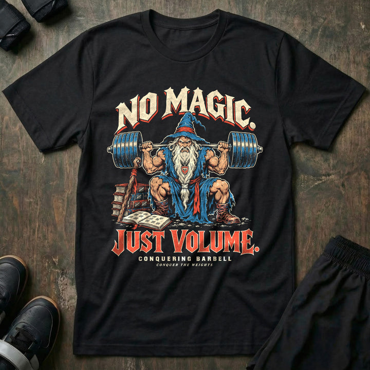 No Magic Just Volume - Tee front graphic in Black with a muscular wizard squatting a loaded barbell beside a training log of tally marks - Conquering Barbell
