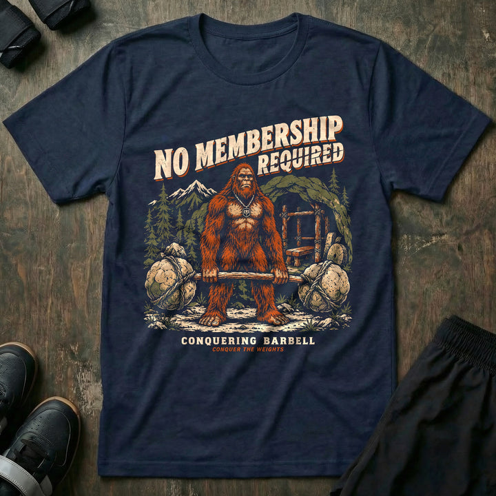 No Membership Required - Tee front graphic in Navy with a sasquatch deadlifting a log loaded with boulders in the forest - Conquering Barbell