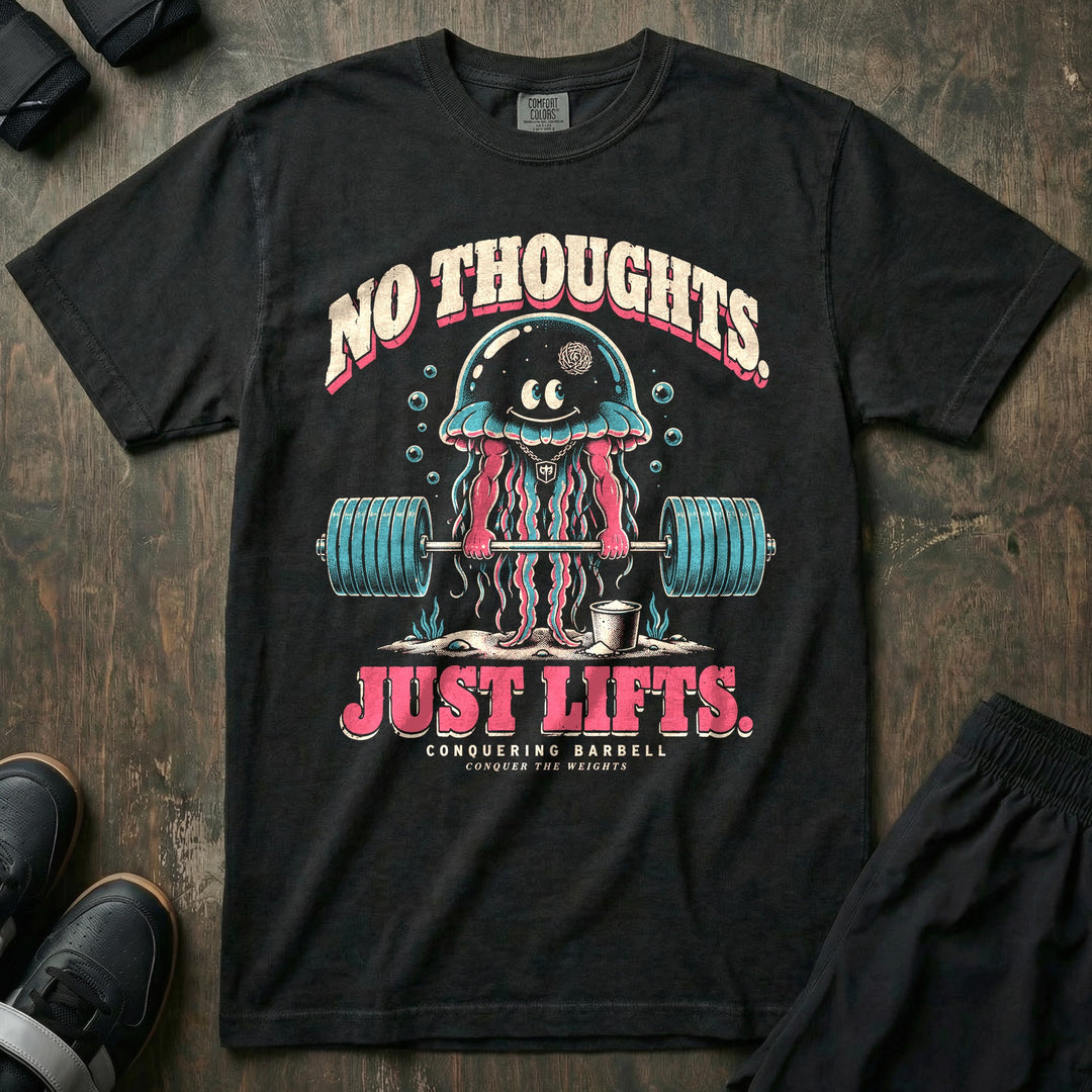 No Thoughts Just Lifts - Relaxed Fit Tee front graphic in Black with a smiling jellyfish with a tiny brain deadlifting a loaded barbell underwater - Conquering Barbell