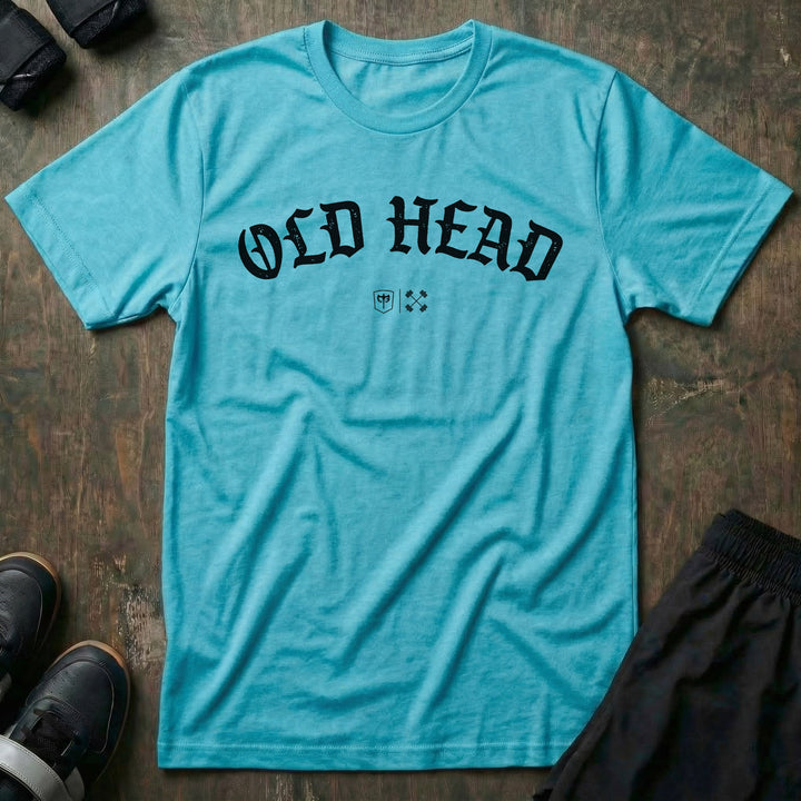 Old Head tee in Tahiti: OLD HEAD in bold old English lettering arched across the chest with small CB marks below
