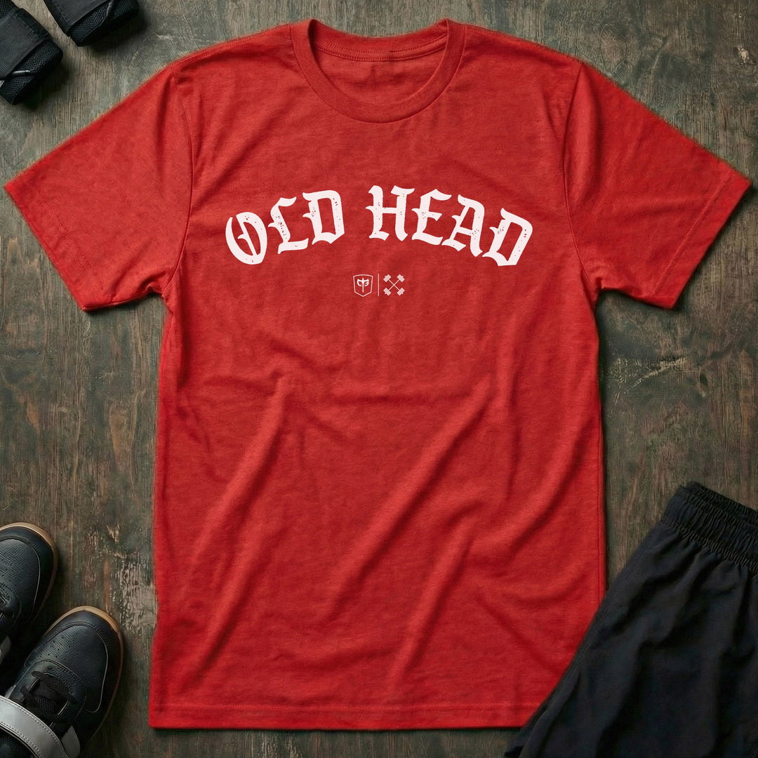 Old Head tee in Red: OLD HEAD in bold old English lettering arched across the chest with small CB marks below