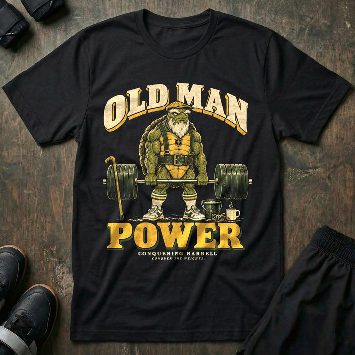 Old Man Power - Tee front graphic in Black with an old bearded tortoise in a flat cap at deadlift lockout - Conquering Barbell