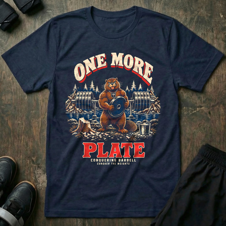 One More Plate - Tee front graphic in Navy with a beaver holding a weight plate in front of a loaded barbell racked over a creek - Conquering Barbell